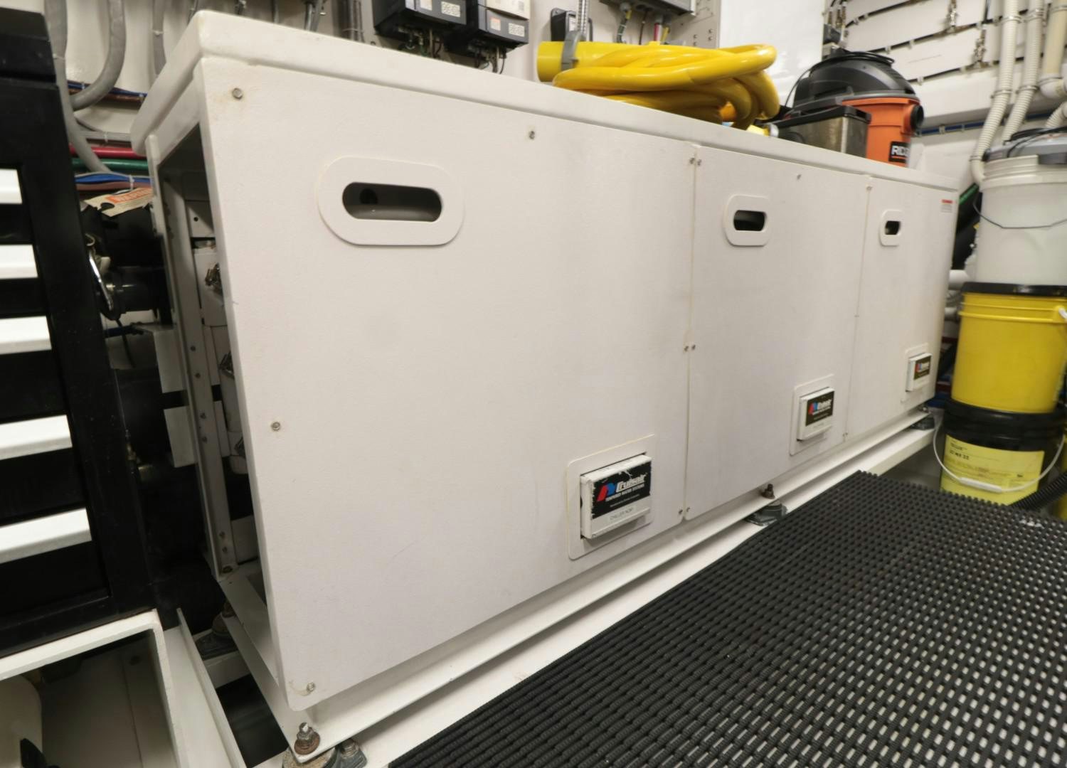 a white machine with black and grey stripes aboard LADY CARMEN Yacht for Sale