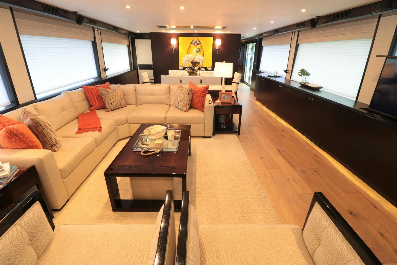 a living room with a couch and a coffee table aboard LADY CARMEN Yacht for Sale