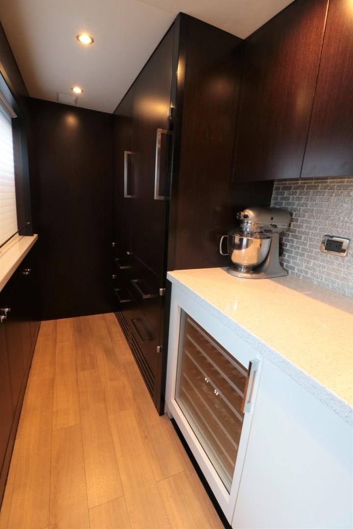 a kitchen with a stainless steel pot aboard LADY CARMEN Yacht for Sale