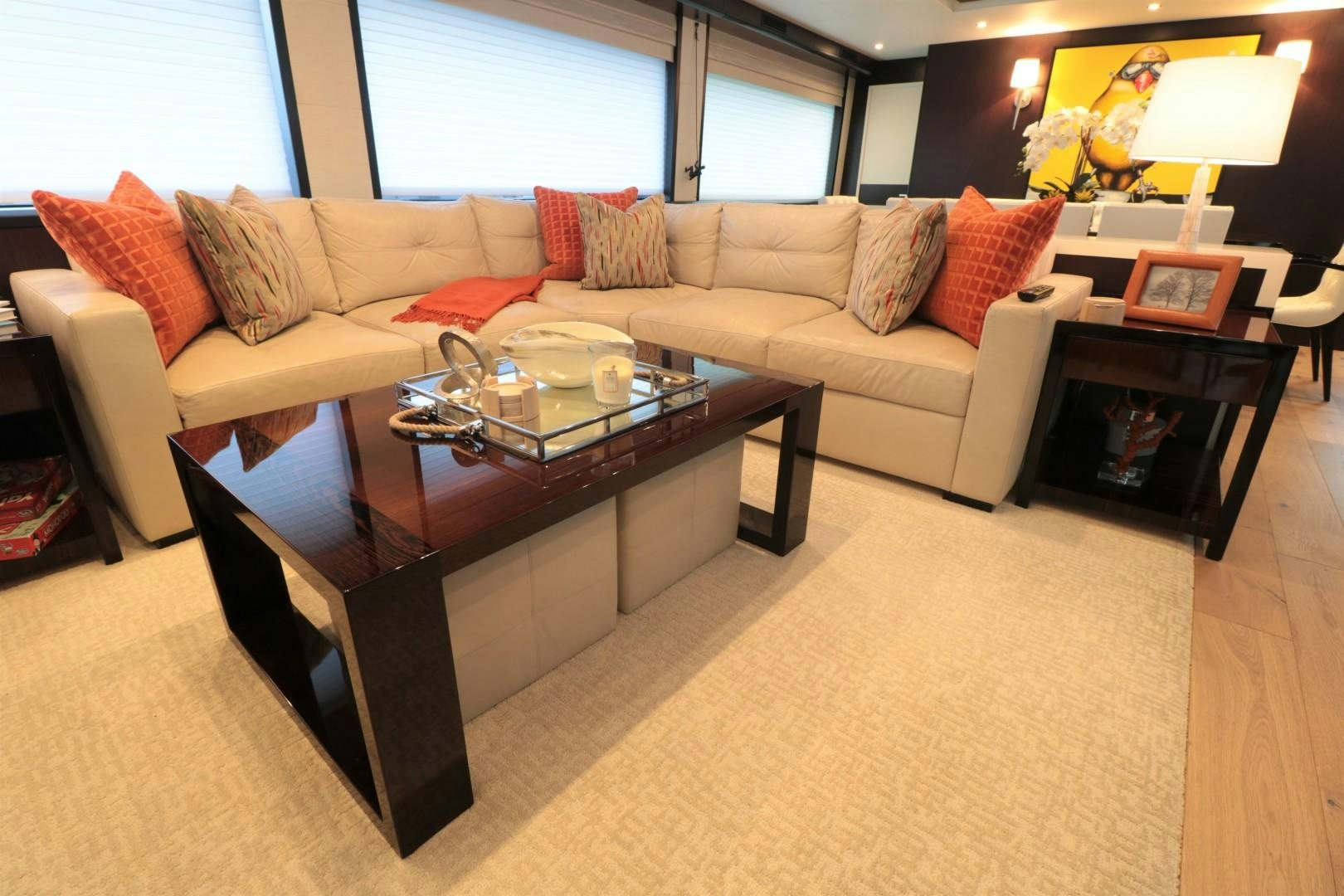 a living room with a coffee table aboard LADY CARMEN Yacht for Sale