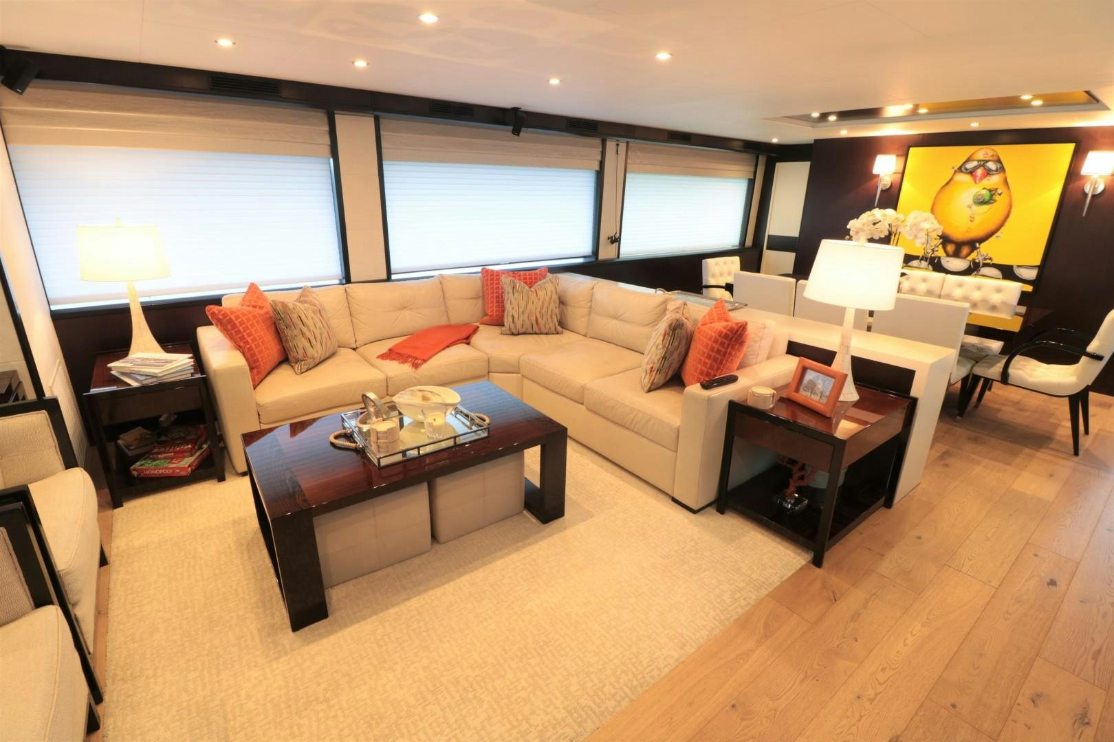 a living room with a couch and a coffee table aboard LADY CARMEN Yacht for Sale