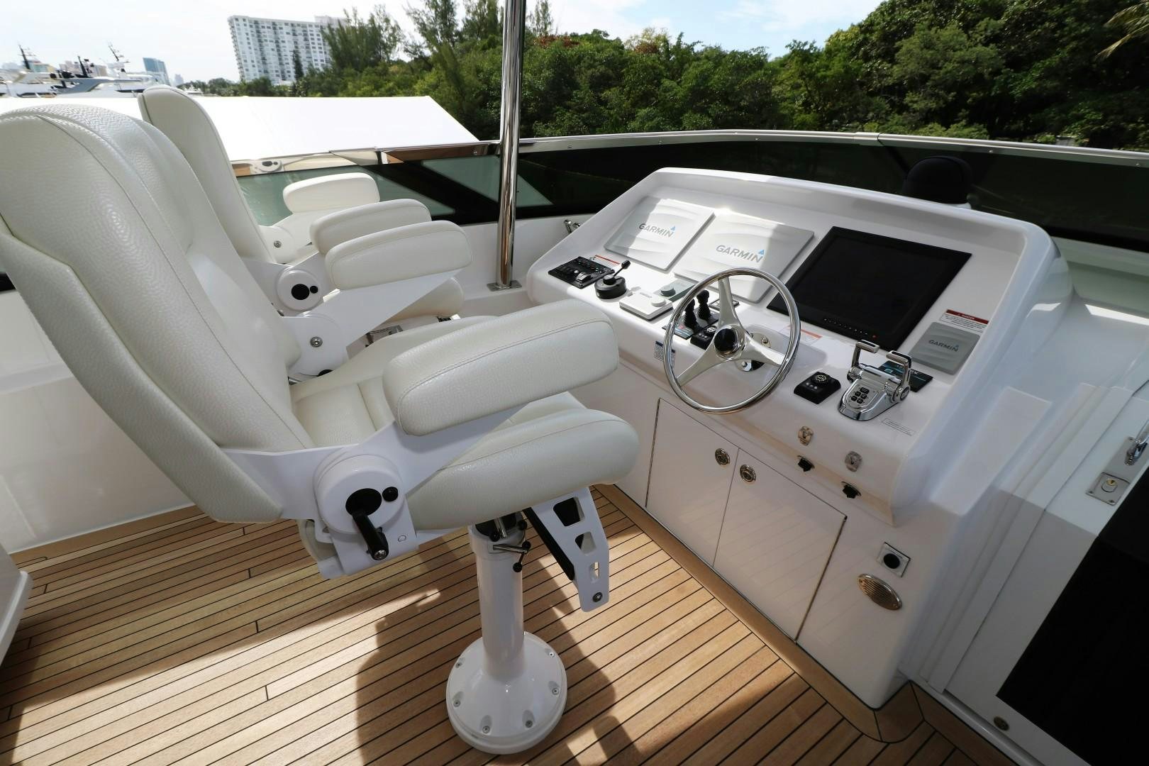 a white machine on a wooden deck aboard LADY CARMEN Yacht for Sale