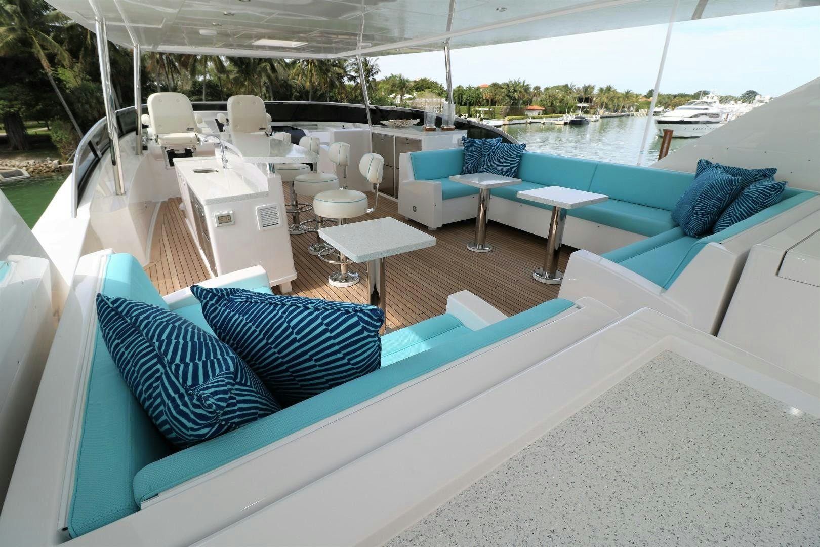 a pool with lounge chairs and a pool aboard LADY CARMEN Yacht for Sale
