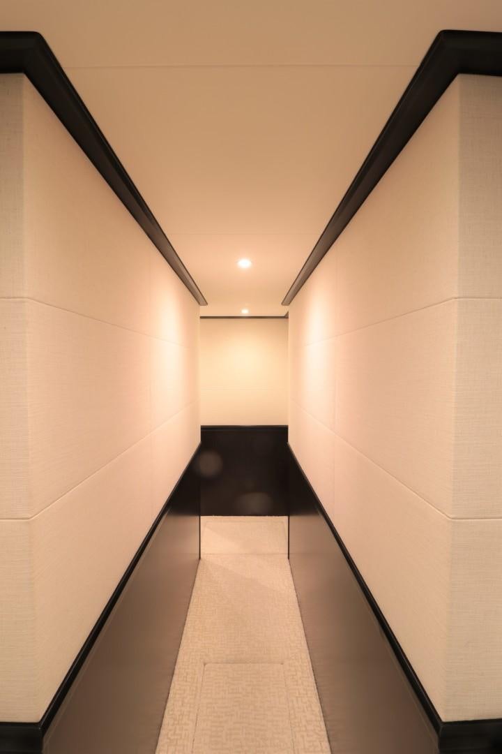 a hallway with white walls aboard LADY CARMEN Yacht for Sale