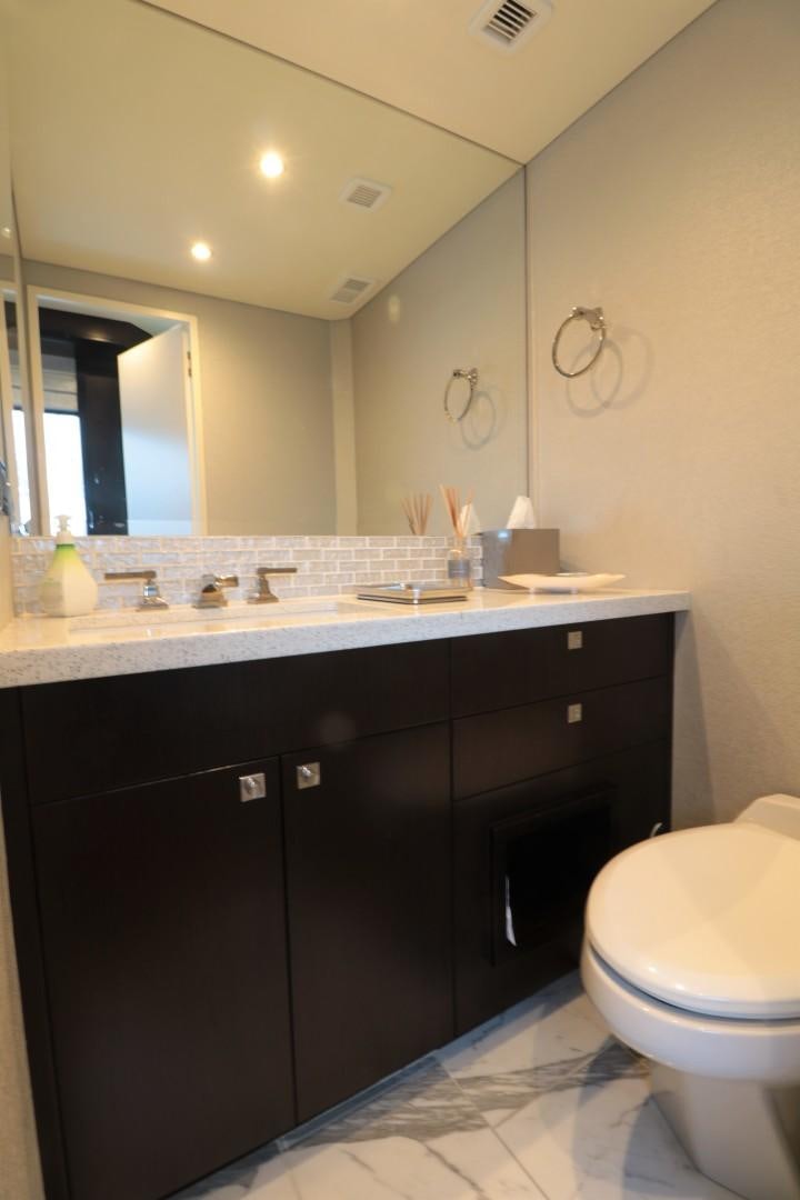a bathroom with a sink and a toilet aboard LADY CARMEN Yacht for Sale