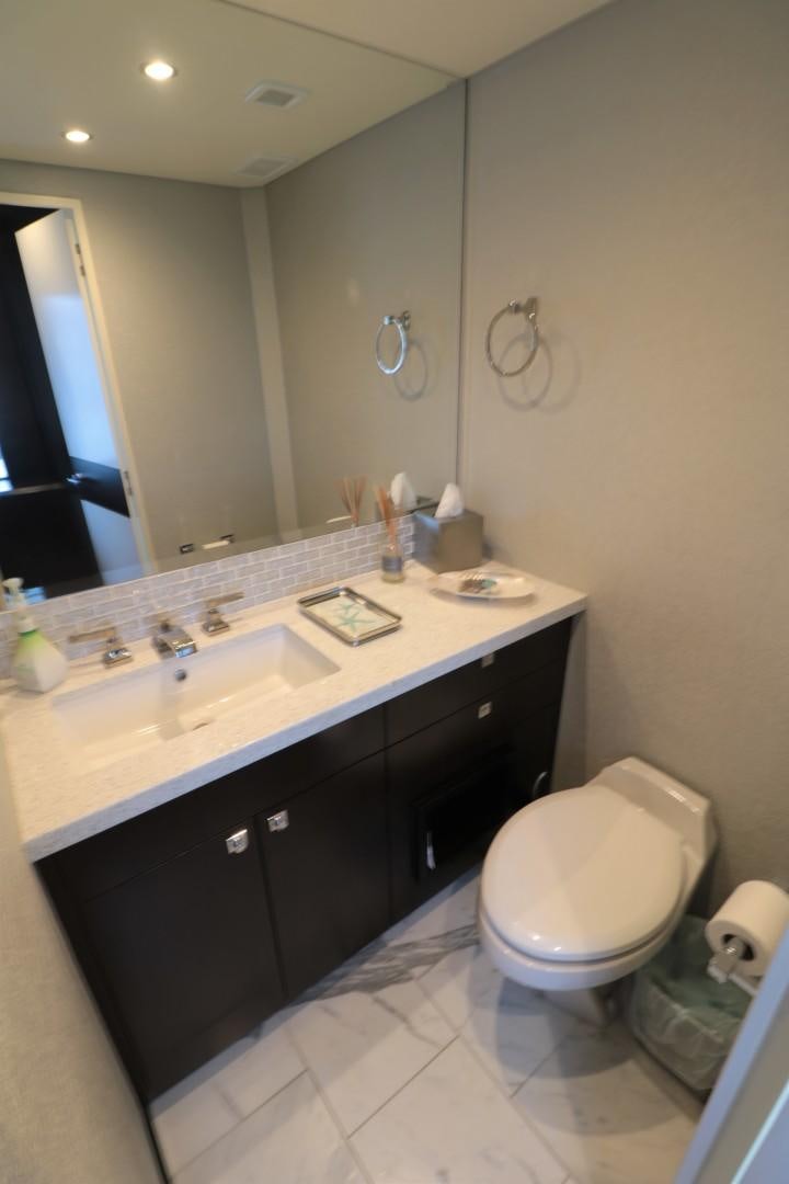 a bathroom with a sink and a toilet aboard LADY CARMEN Yacht for Sale