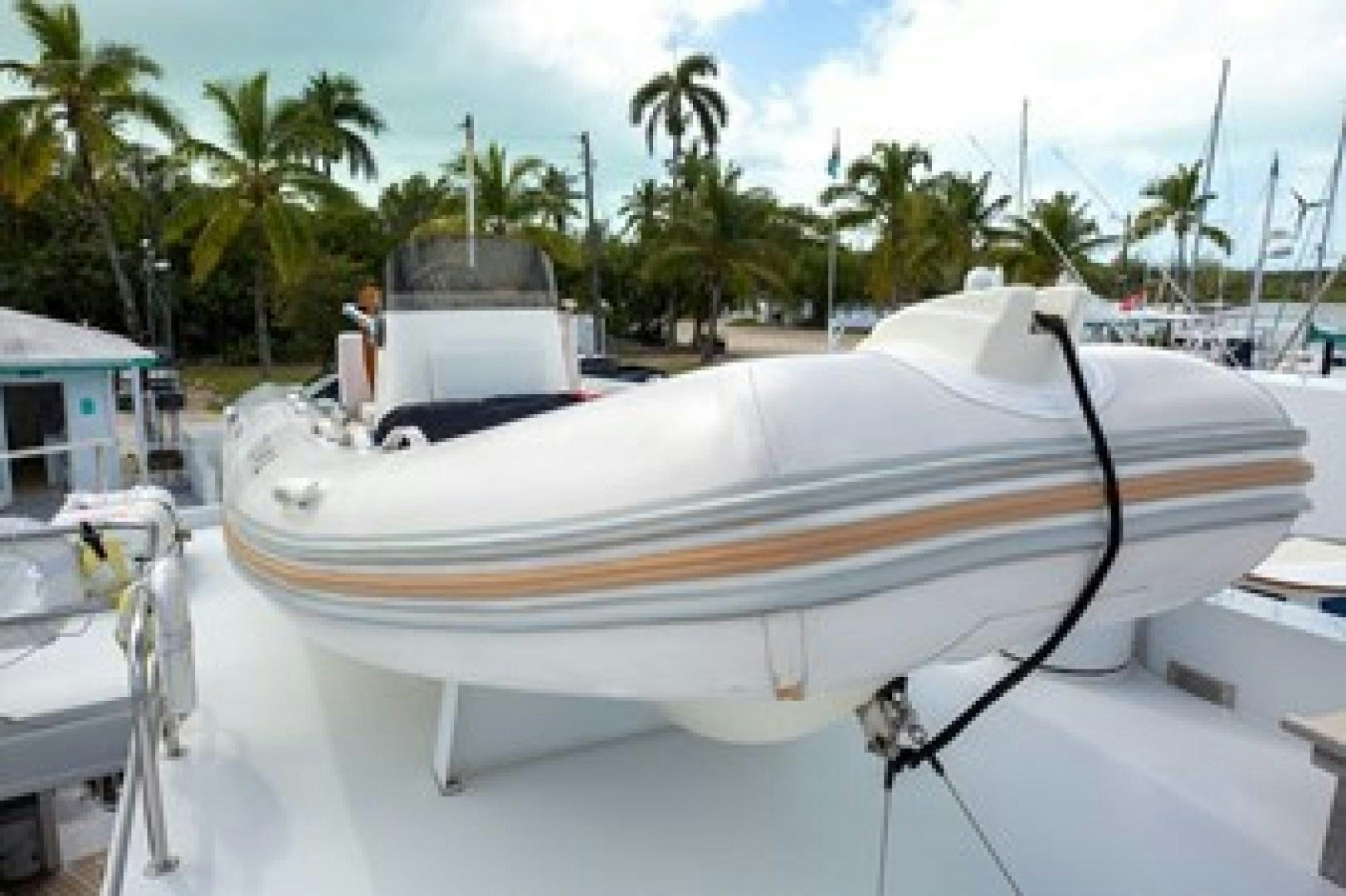 a boat with a white sail aboard TAIMA Yacht for Sale