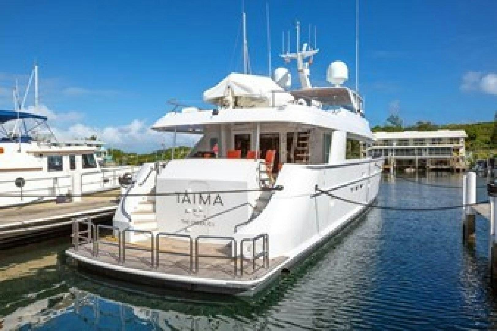 a white boat in the water aboard TAIMA Yacht for Sale