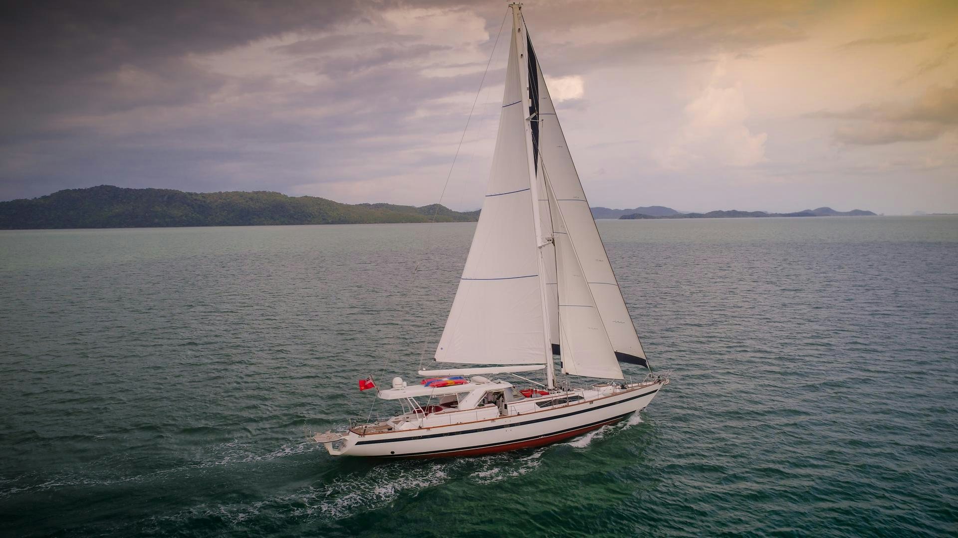 a sailboat in the water aboard TARONGA Yacht for Sale