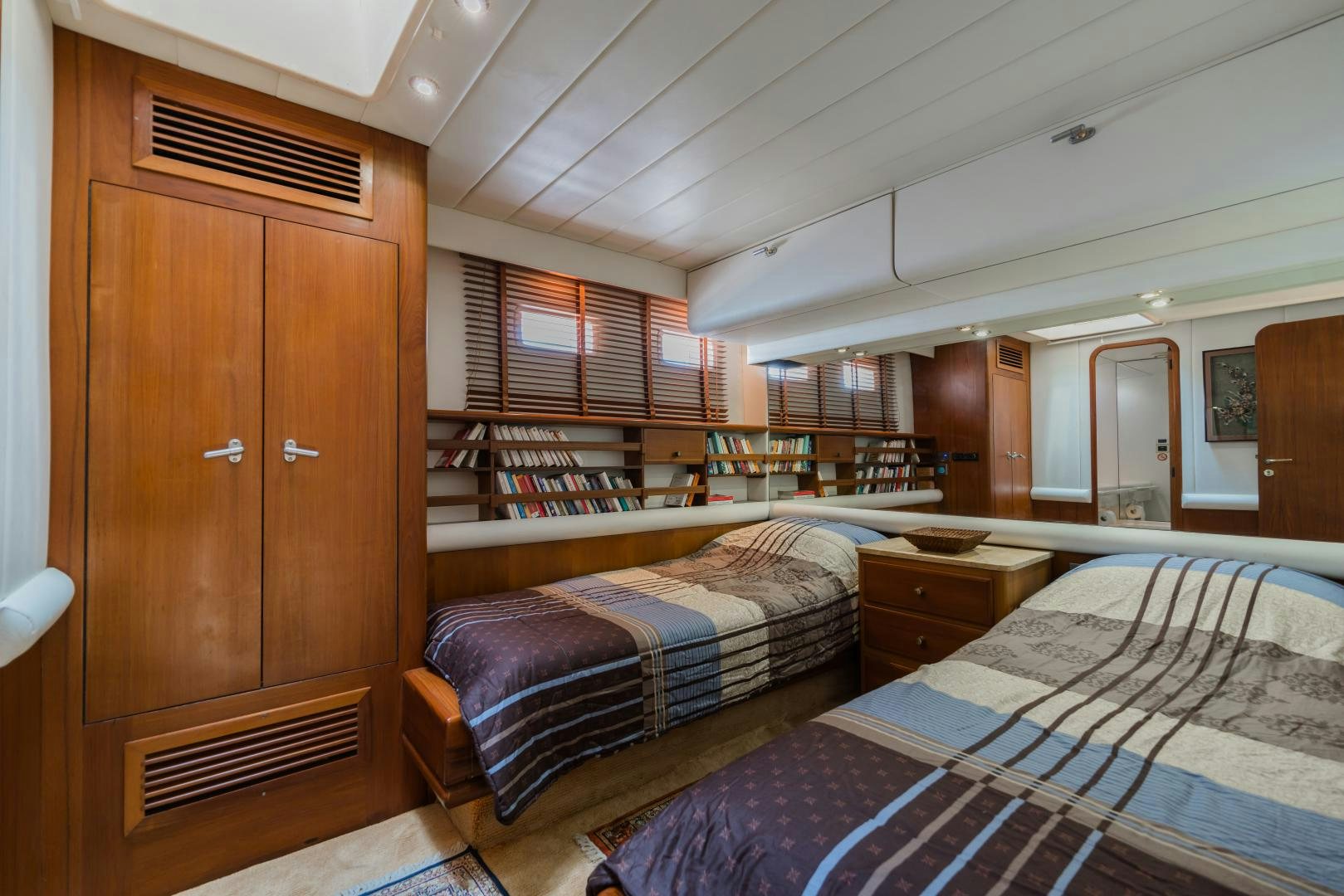 a room with bunk beds aboard TARONGA Yacht for Sale
