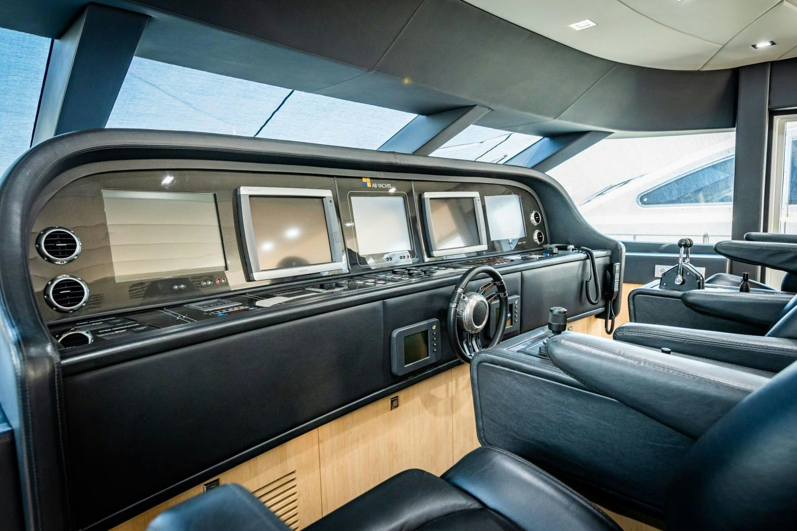 the inside of a car aboard REVEIL Yacht for Sale
