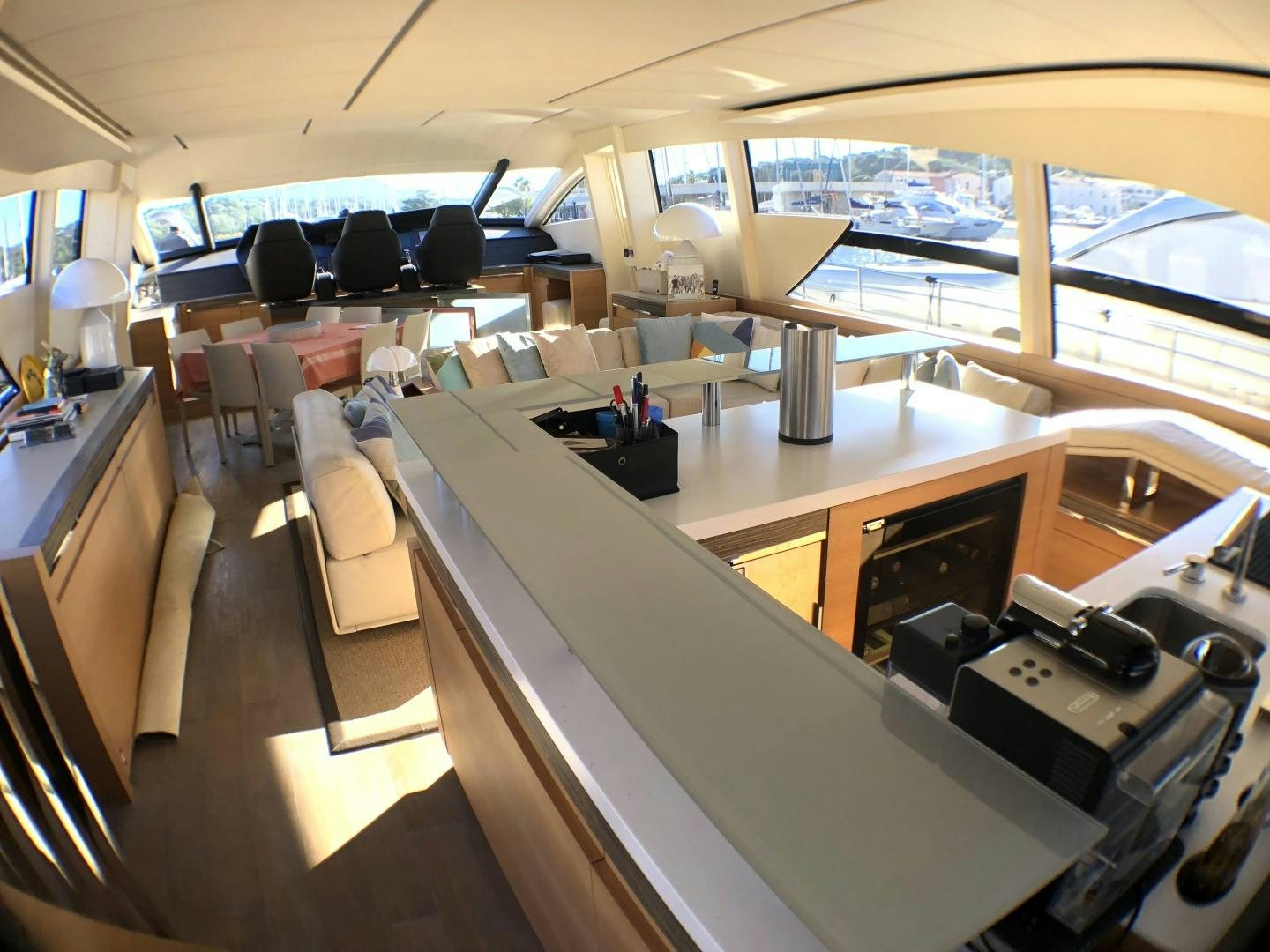 inside of a building with a large window and a view of the water aboard DORIS Yacht for Sale