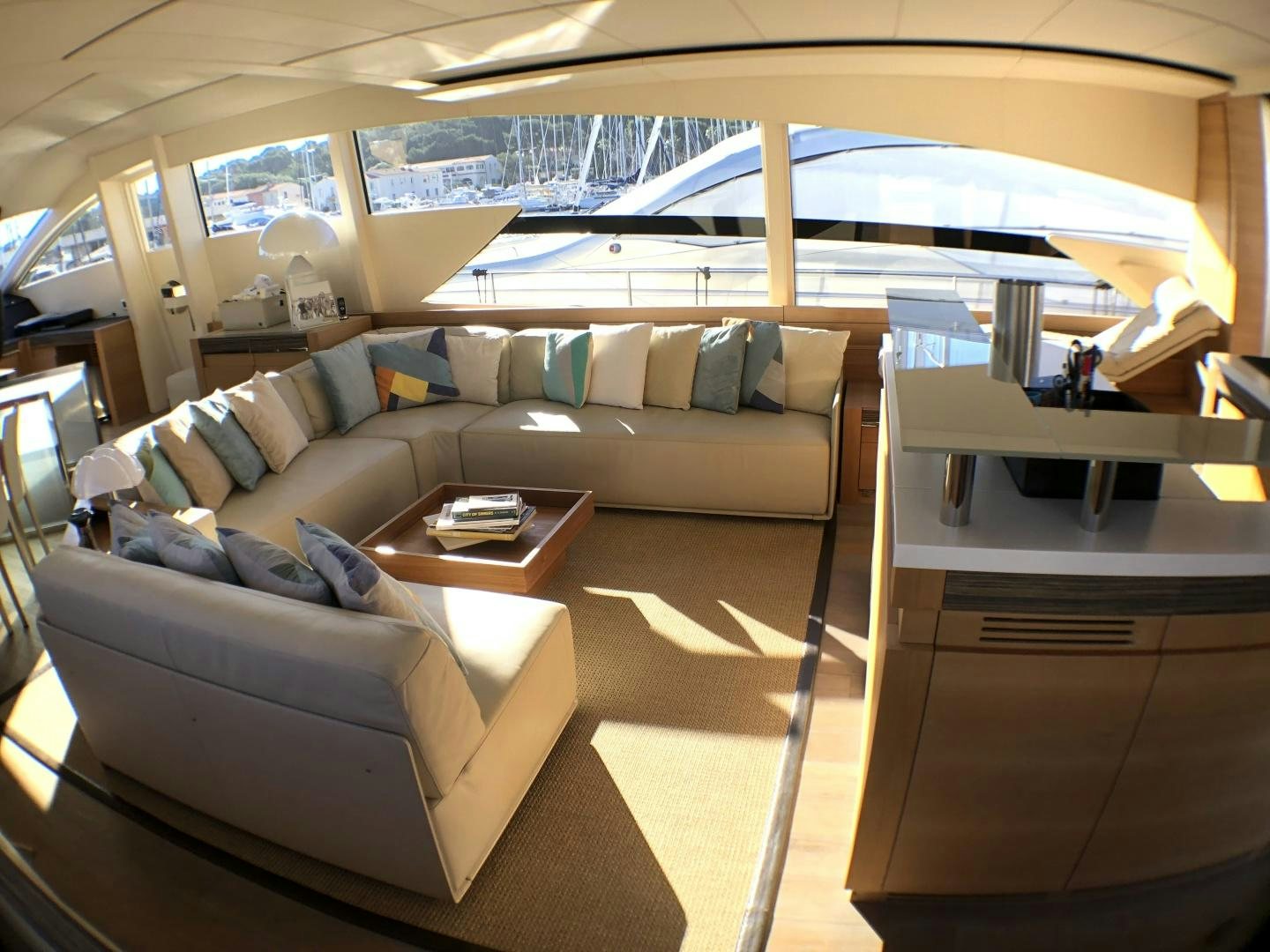 a living room with a couch and a coffee table aboard DORIS Yacht for Sale