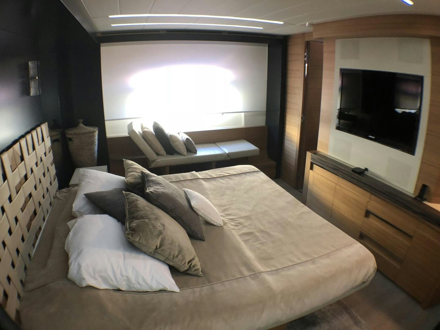 a bed with white pillows aboard DORIS Yacht for Sale
