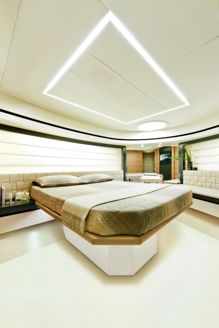 a bed in a room aboard DORIS Yacht for Sale