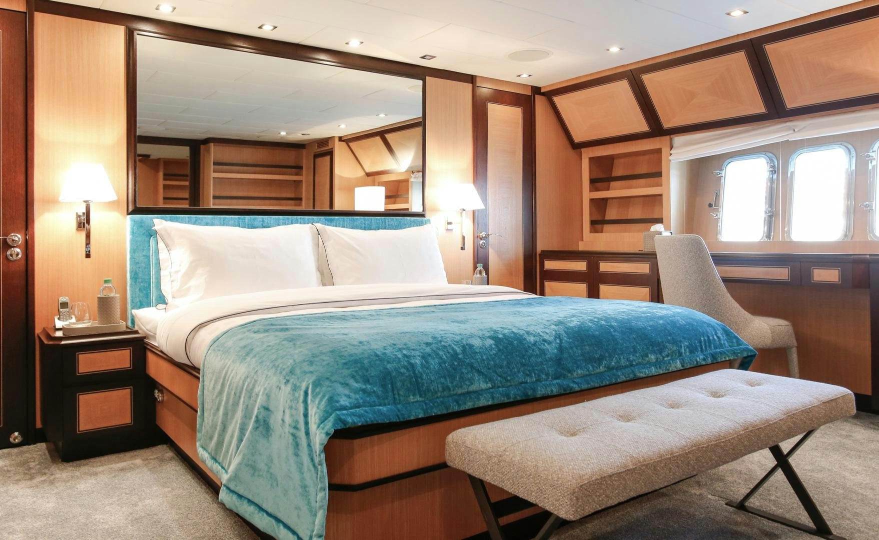 a couple of beds in a room aboard THE OFFICE Yacht for Sale