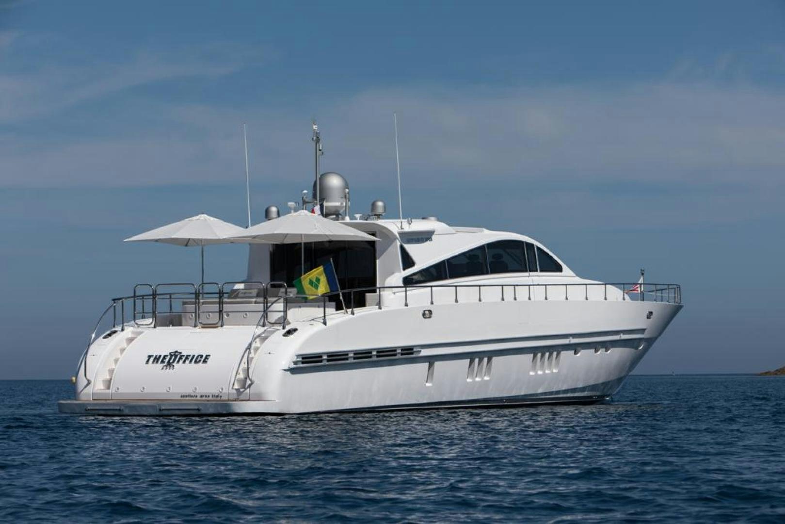 a white yacht in the water aboard THE OFFICE Yacht for Sale
