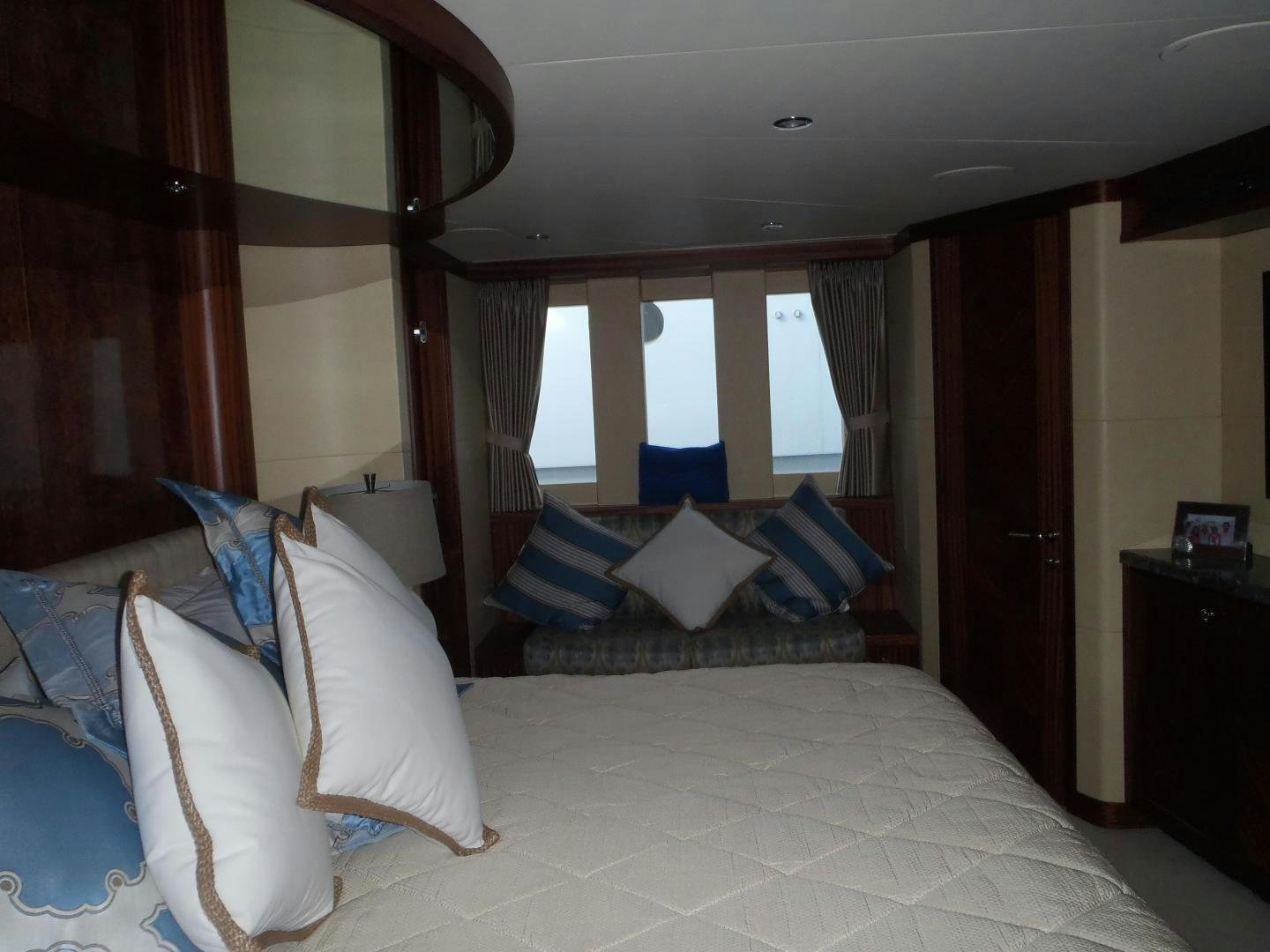 a bed with pillows and pillows aboard CLAYPEN Yacht for Sale