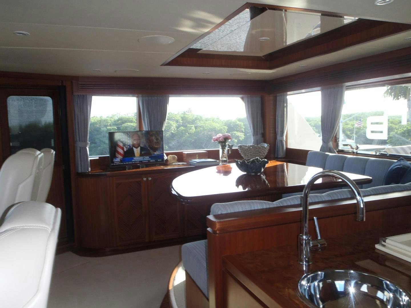 a kitchen with a sink and a window aboard CLAYPEN Yacht for Sale
