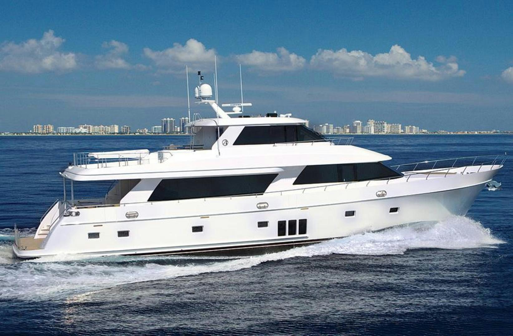 a white yacht on the water aboard CLAYPEN Yacht for Sale