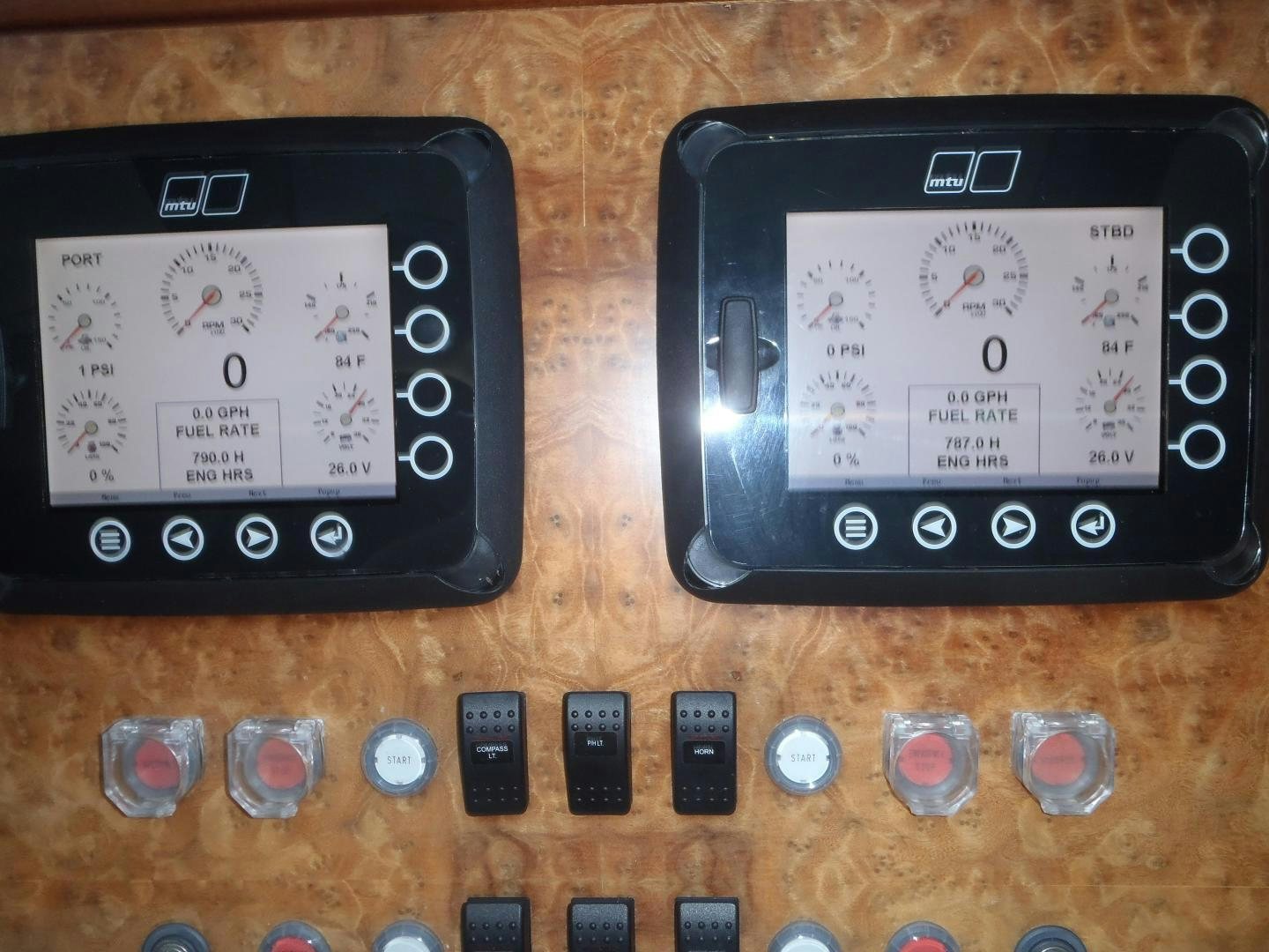 a group of cell phones on a table aboard CLAYPEN Yacht for Sale