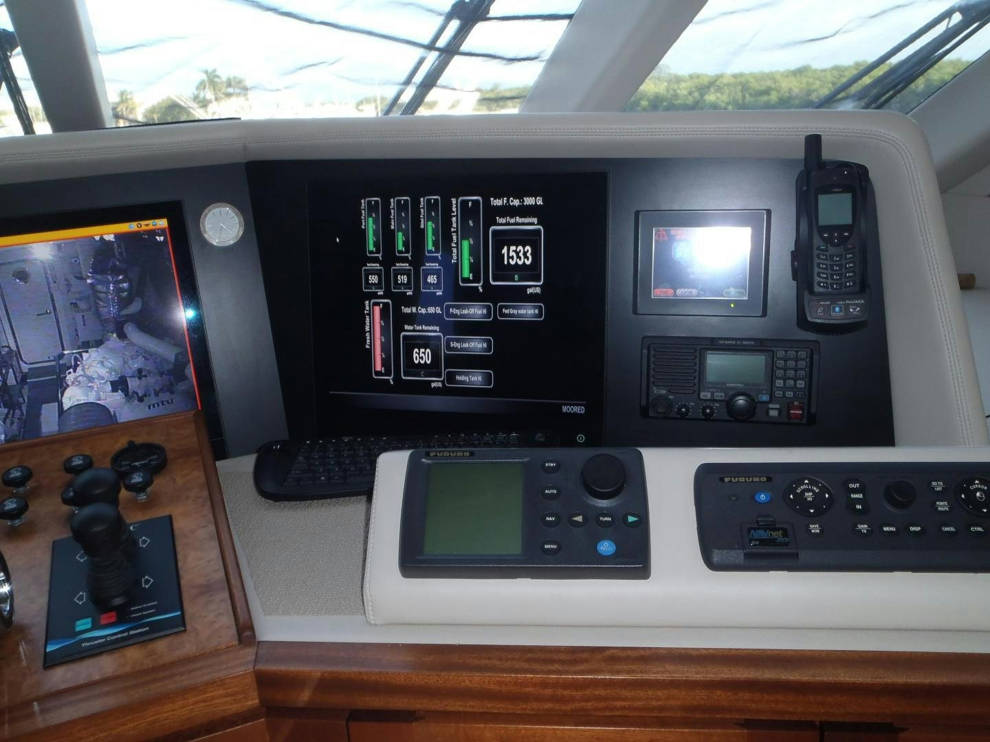 a group of electronic devices aboard CLAYPEN Yacht for Sale