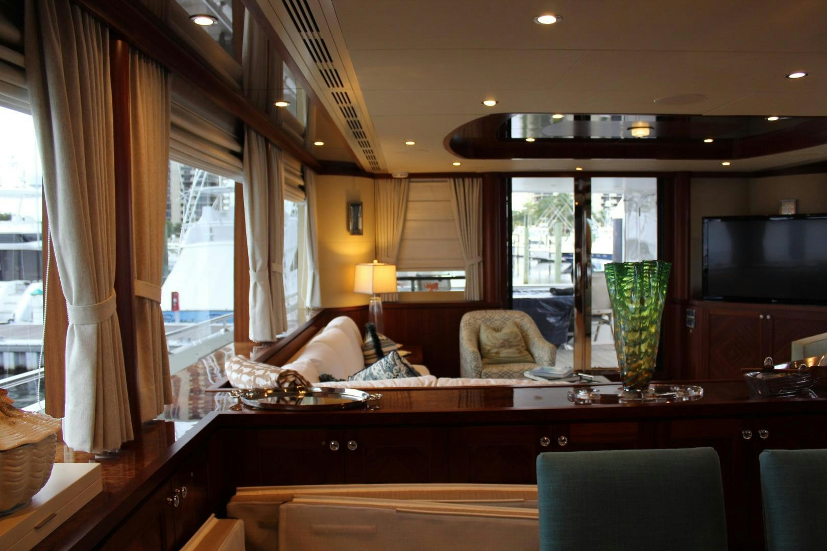 a room with a table and chairs aboard CLAYPEN Yacht for Sale