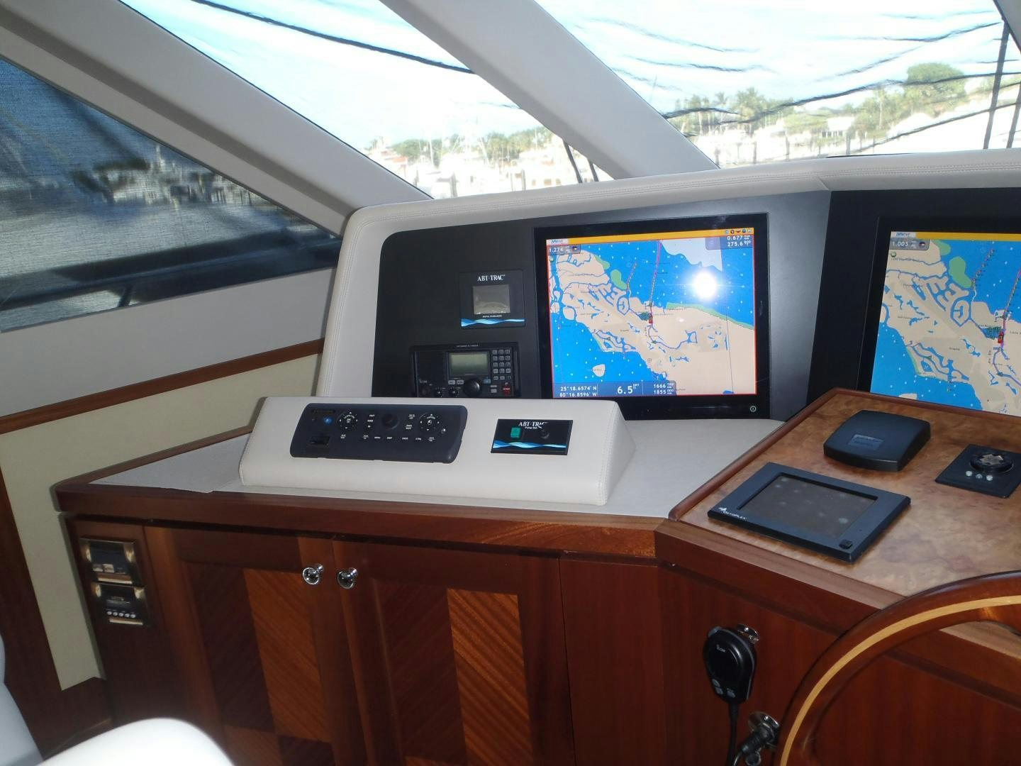 a desk with a couple of monitors aboard CLAYPEN Yacht for Sale