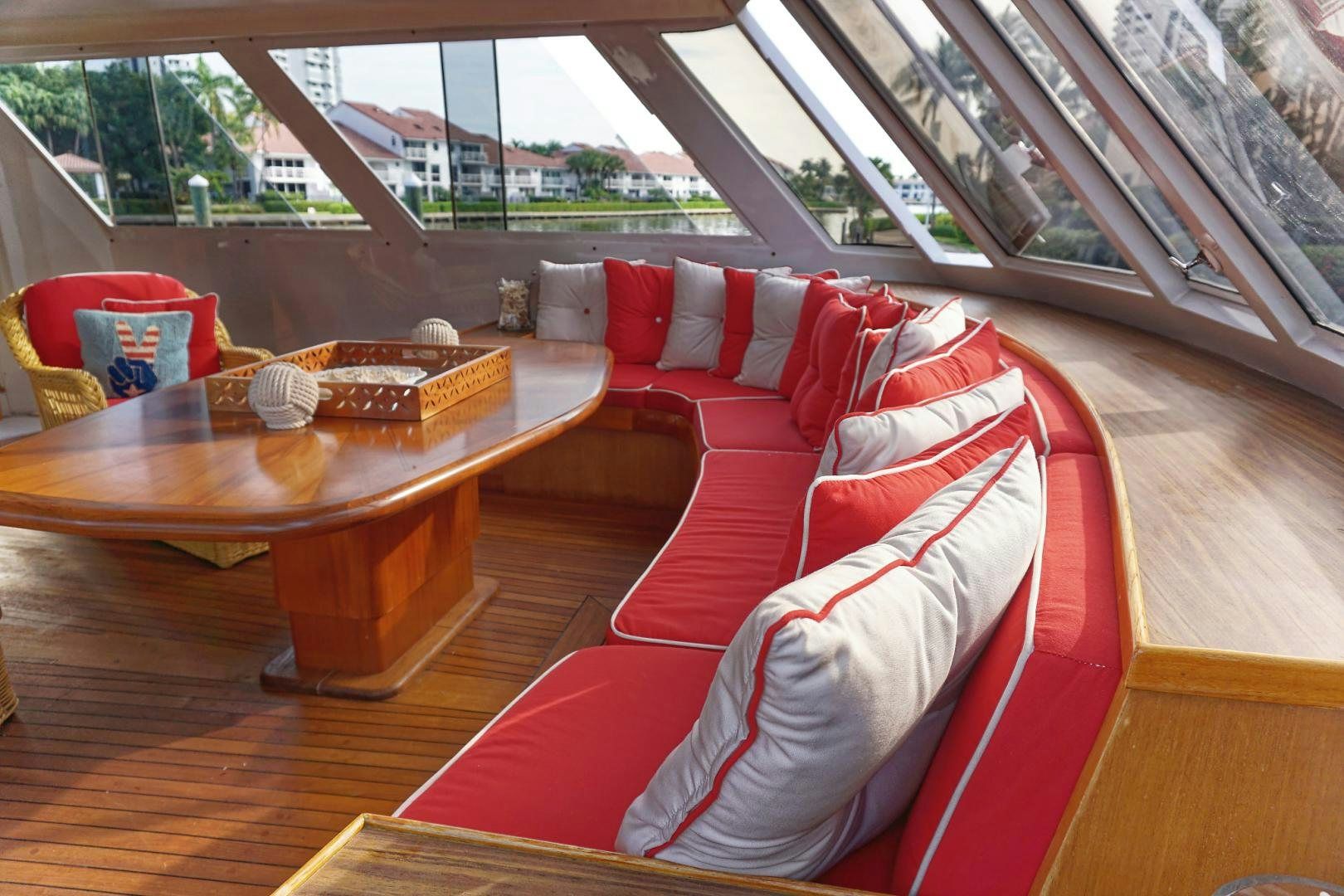 a couch and table in a room aboard NO NAME Yacht for Sale