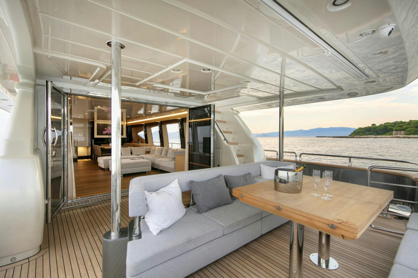 a room with a couch and a table aboard URSUS V Yacht for Sale