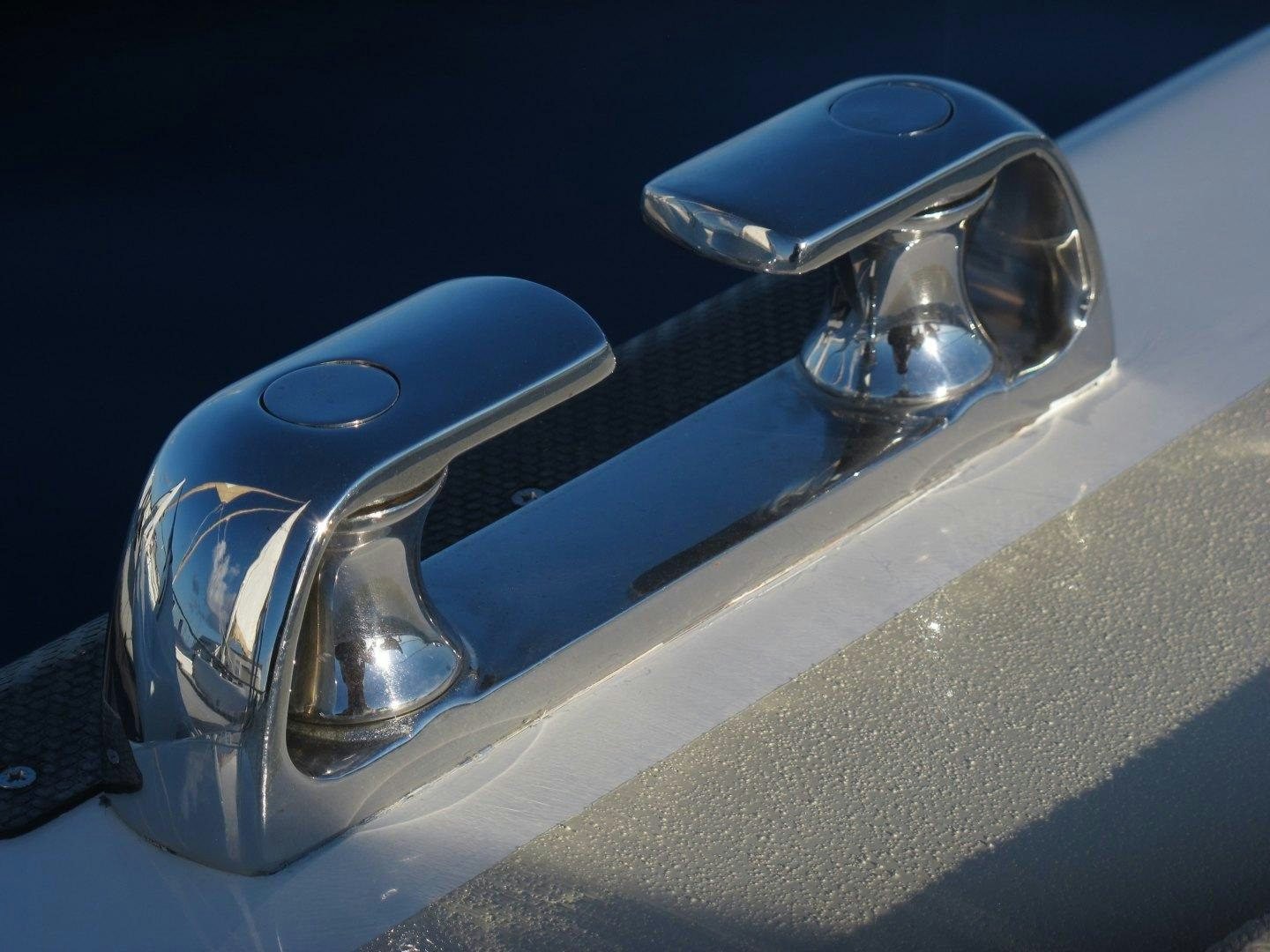 a close-up of a car door handle aboard LONESTAR Yacht for Sale