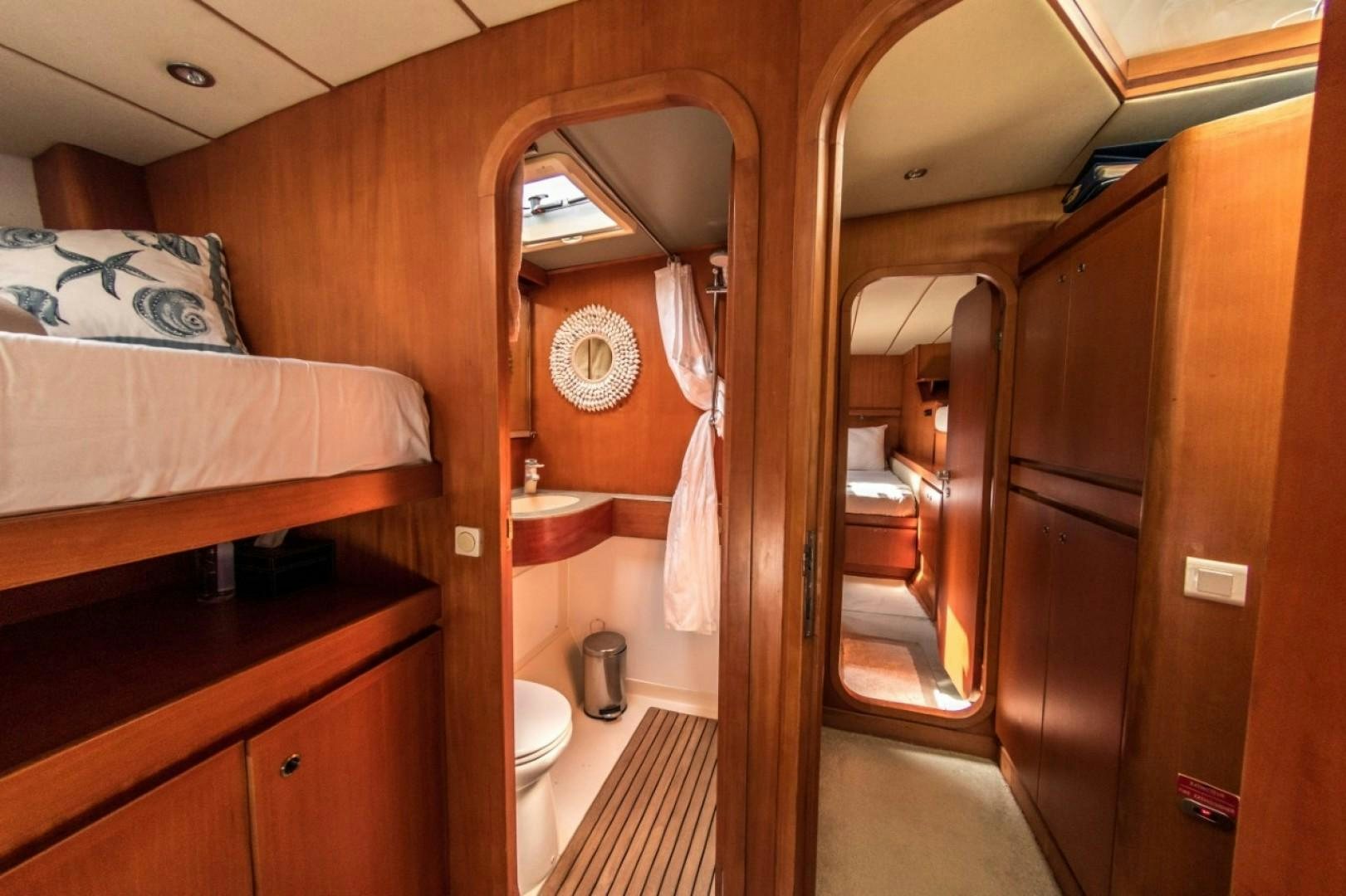 a bathroom with a large mirror aboard LONESTAR Yacht for Sale