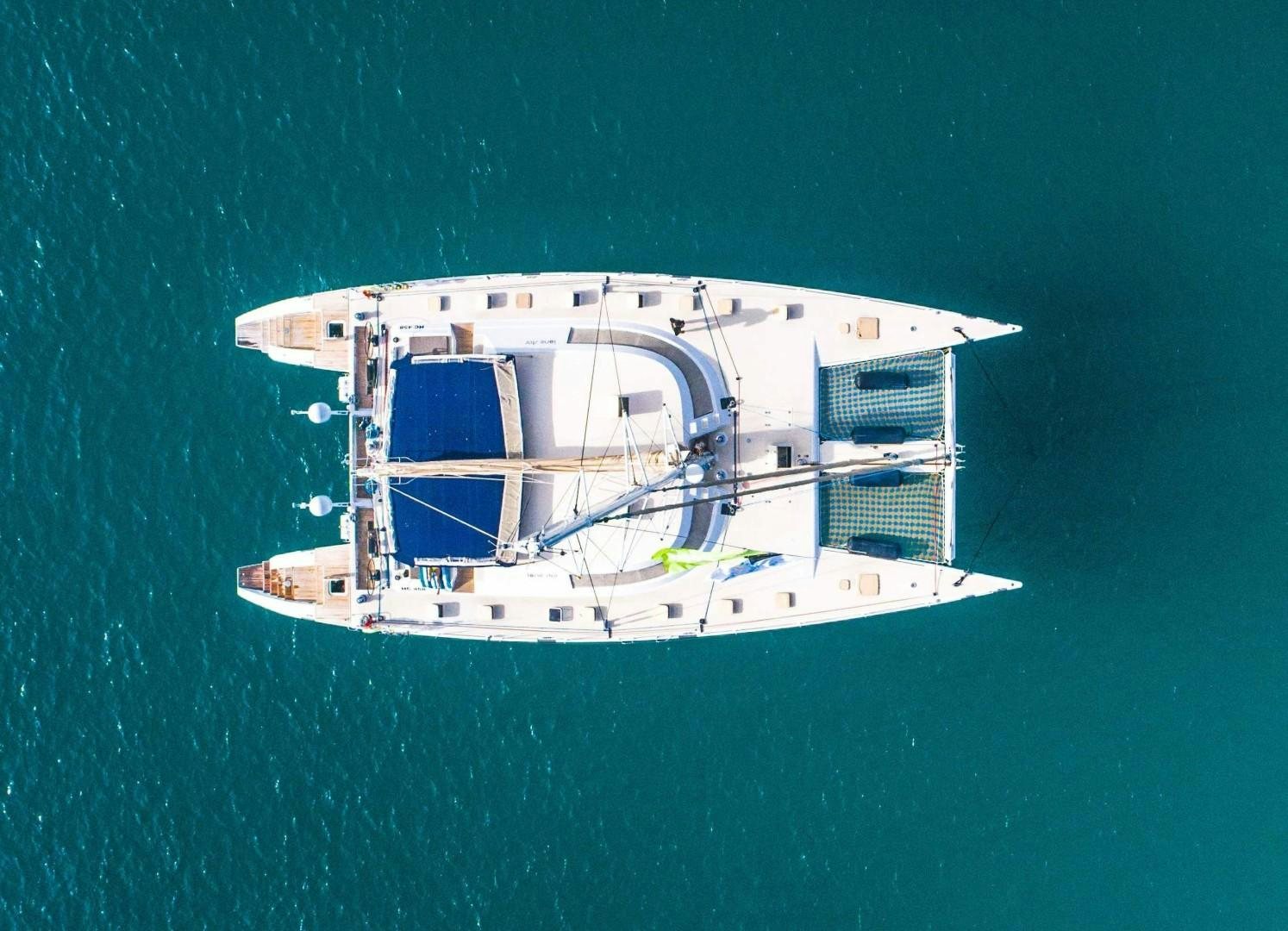 a white boat in the water aboard LONESTAR Yacht for Sale