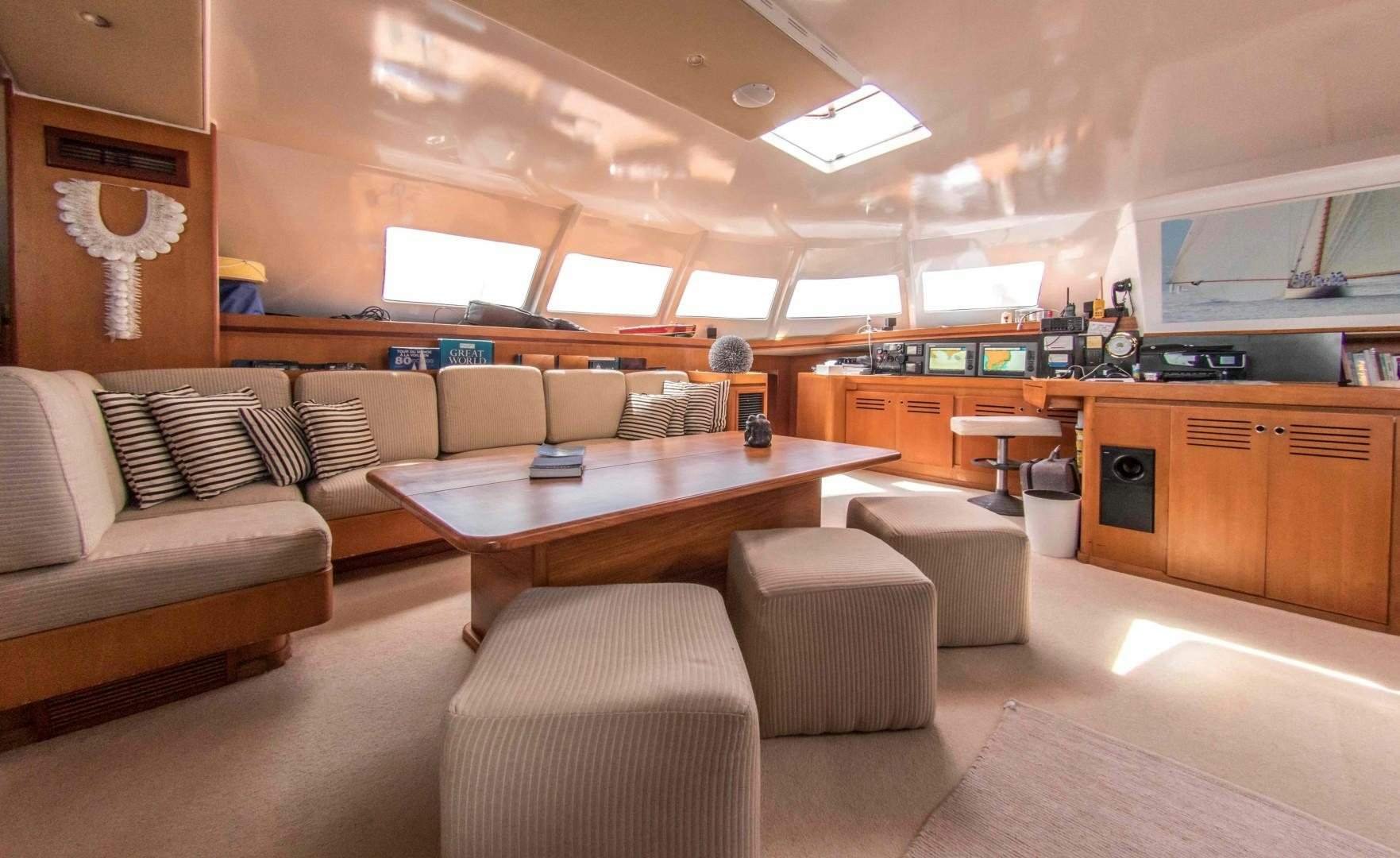 a living room with a couch and a table aboard LONESTAR Yacht for Sale