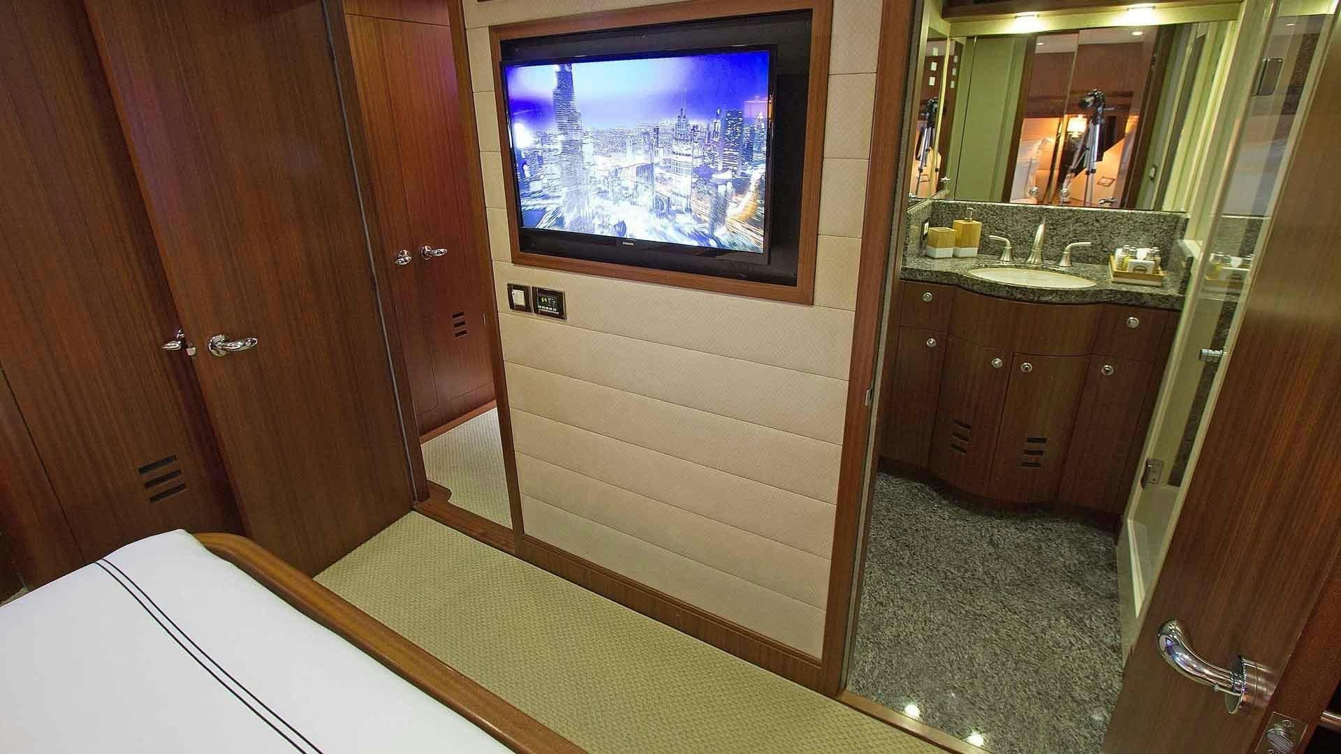 a bathroom with a large window aboard JUS CHILL'N Yacht for Sale