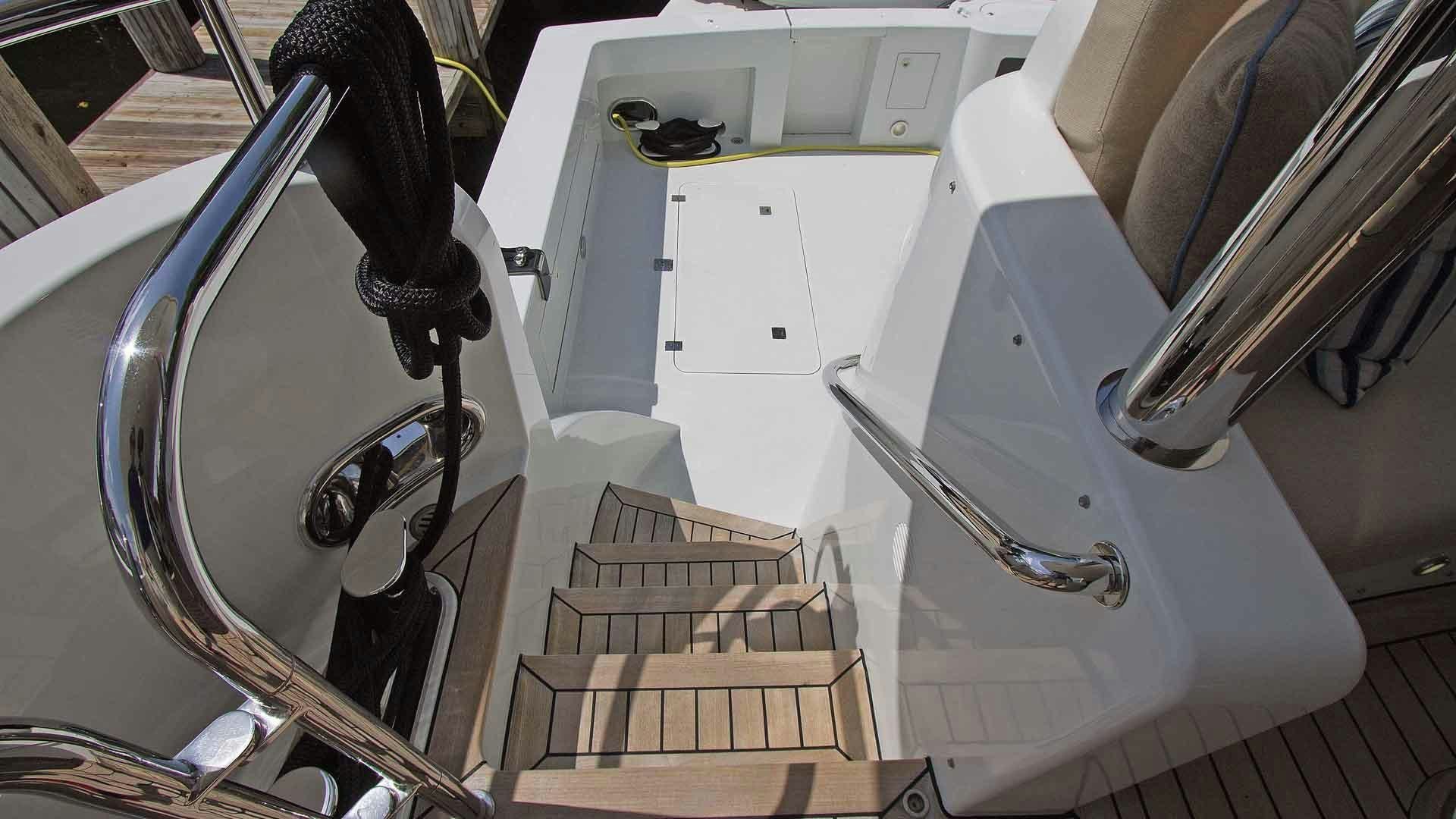 a person holding a metal object aboard JUS CHILL'N Yacht for Sale