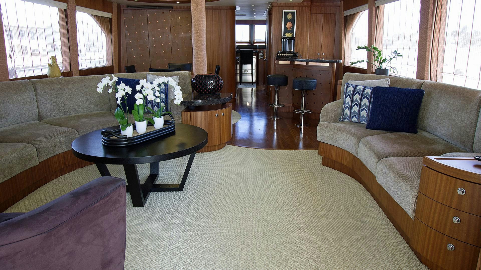 a living room with a couch and a coffee table aboard JUS CHILL'N Yacht for Sale