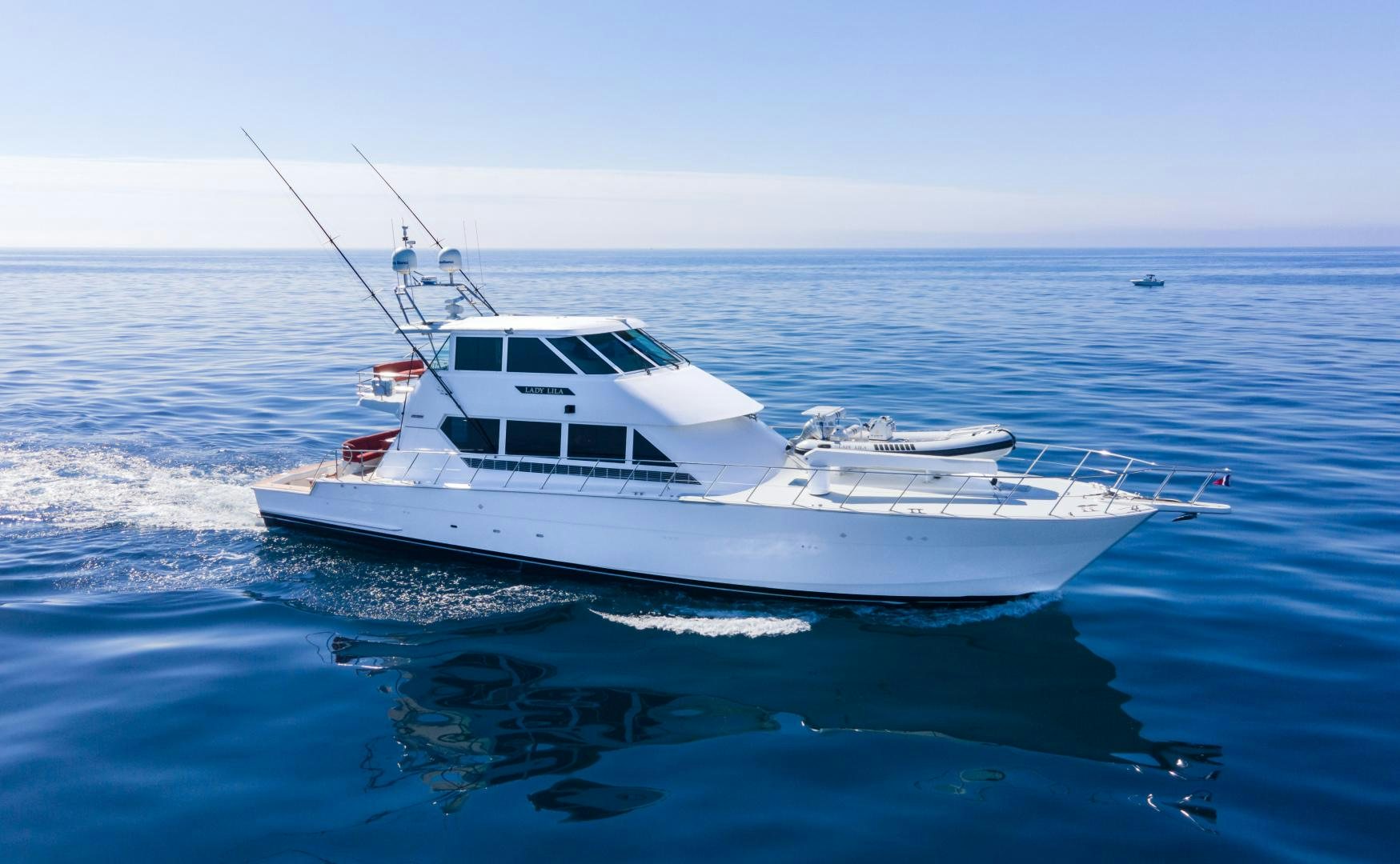 a white boat in the water aboard LADY LILA Yacht for Sale