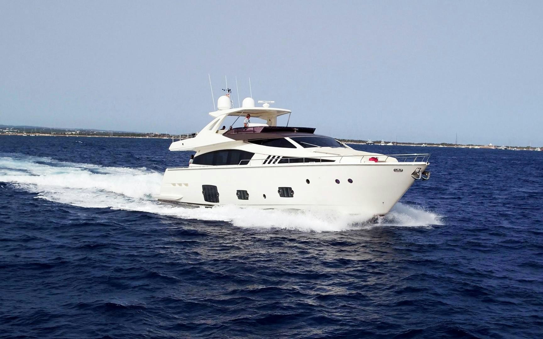 a white yacht on the water aboard LA PACE Yacht for Sale