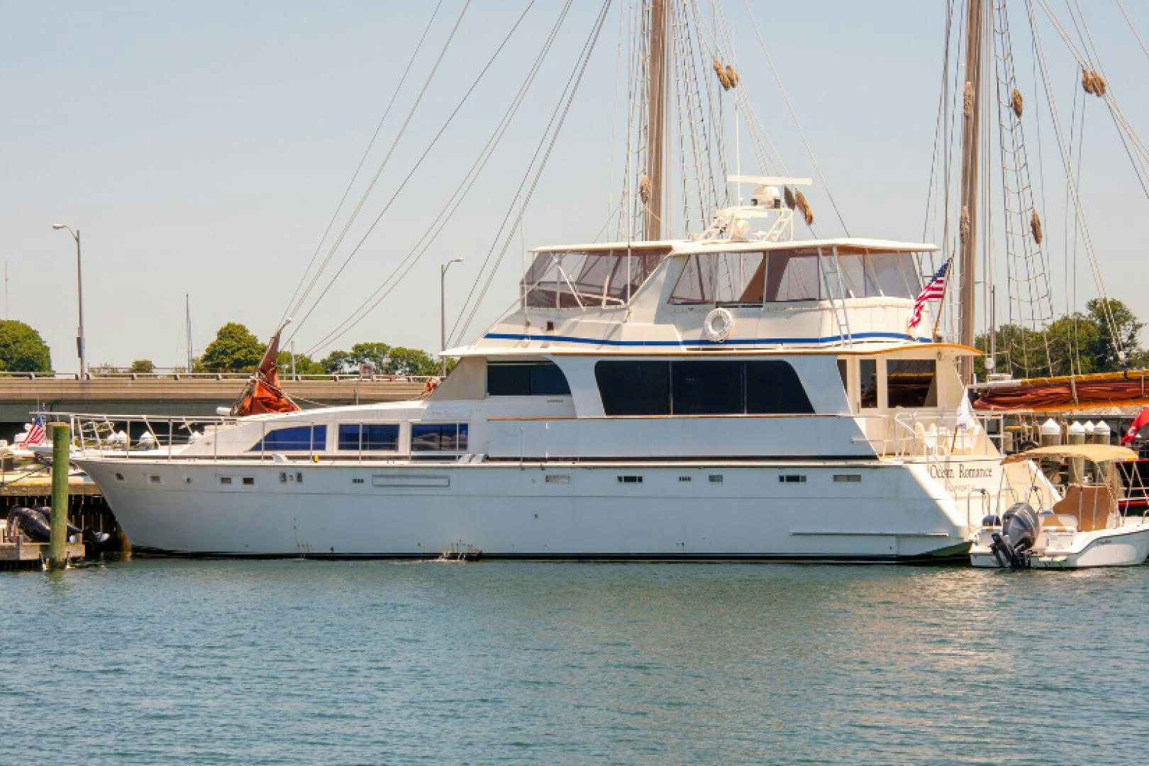 a large white boat in the water aboard OCEAN ROMANCE Yacht for Sale