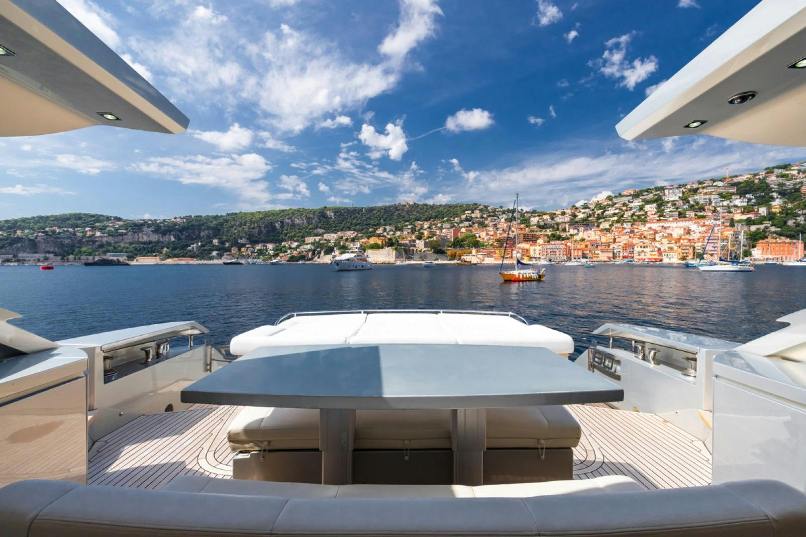 a view of a city from a boat aboard LOUNOR Yacht for Sale