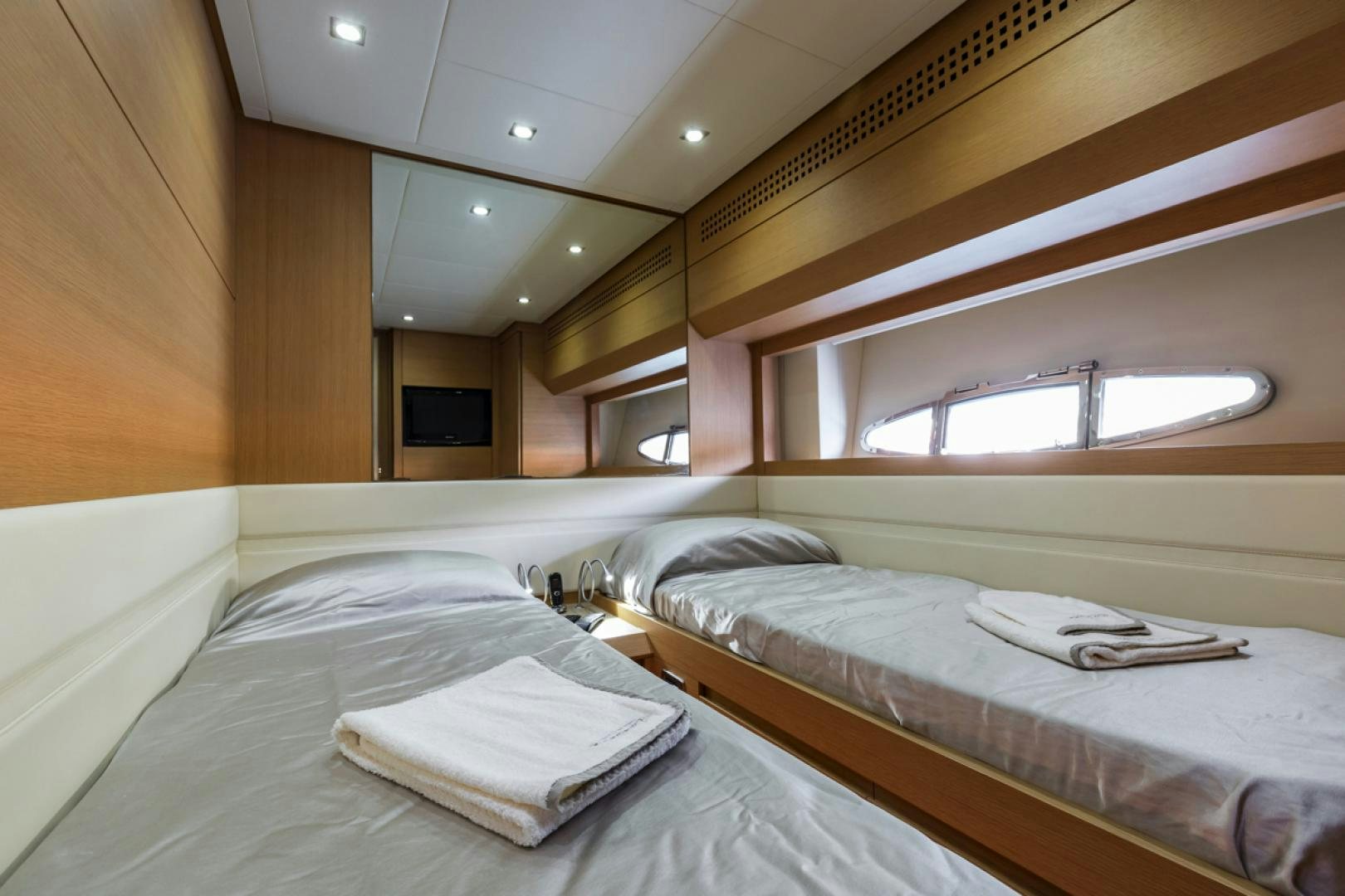 a room with two beds aboard LOUNOR Yacht for Sale