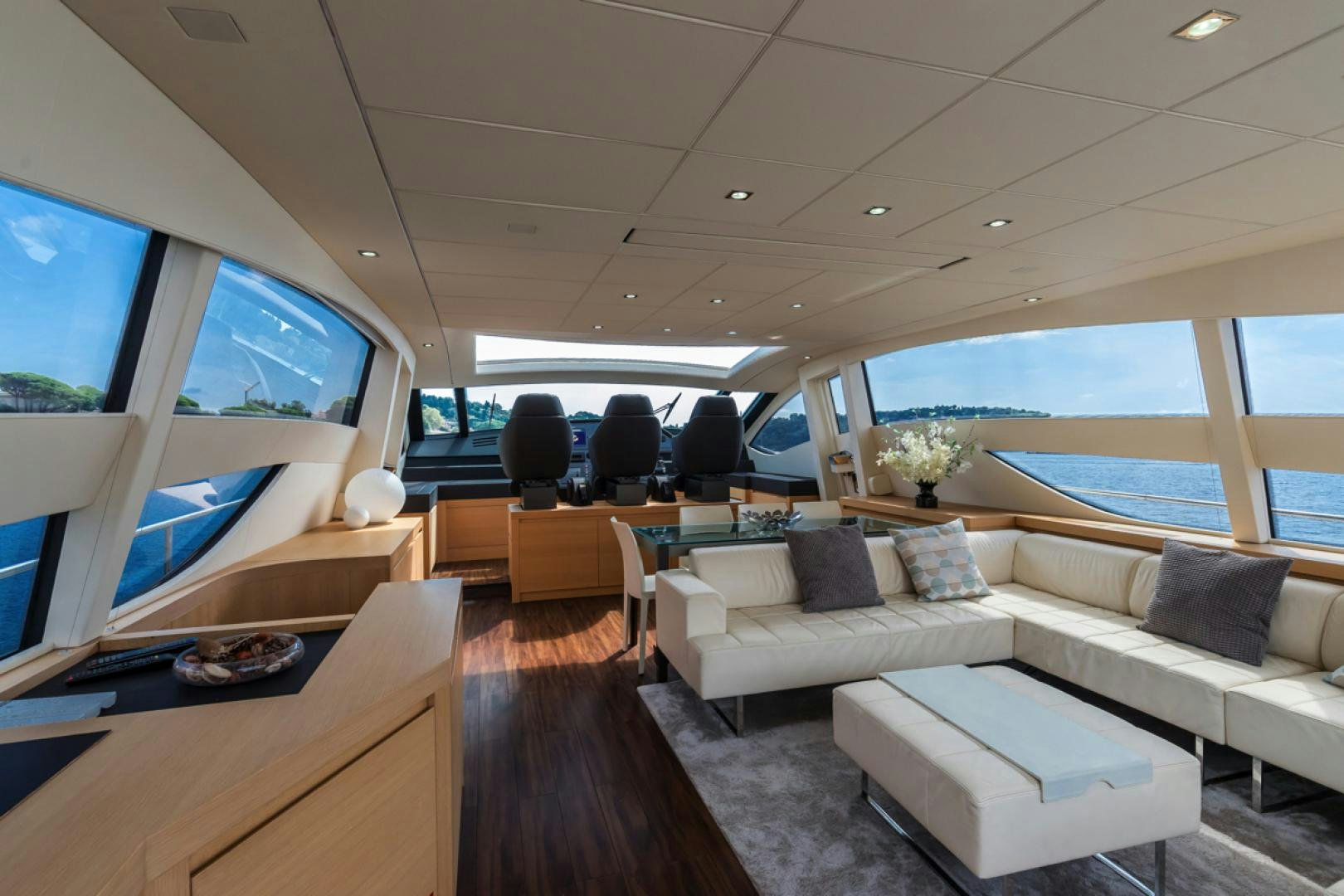 a room with a couch and a television aboard LOUNOR Yacht for Sale