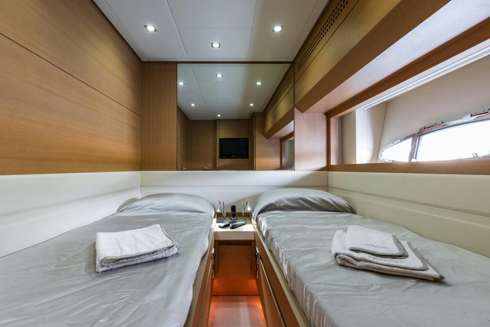 a room with two beds aboard LOUNOR Yacht for Sale