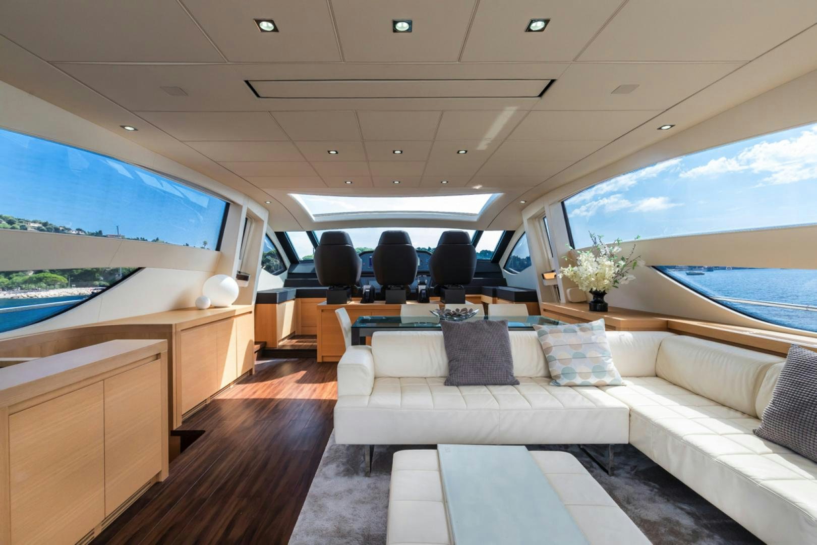 a room with a couch and a pool aboard LOUNOR Yacht for Sale