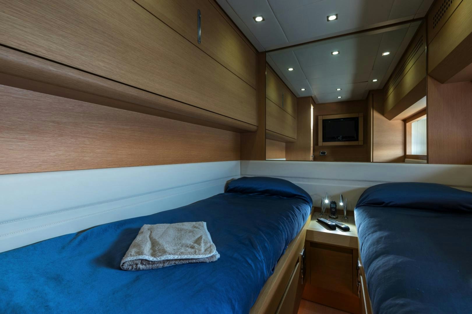 a room with two beds aboard LOUNOR Yacht for Sale