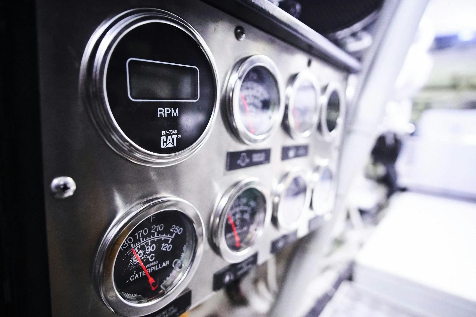 a close-up of a car's dashboard aboard SYBER Yacht for Sale