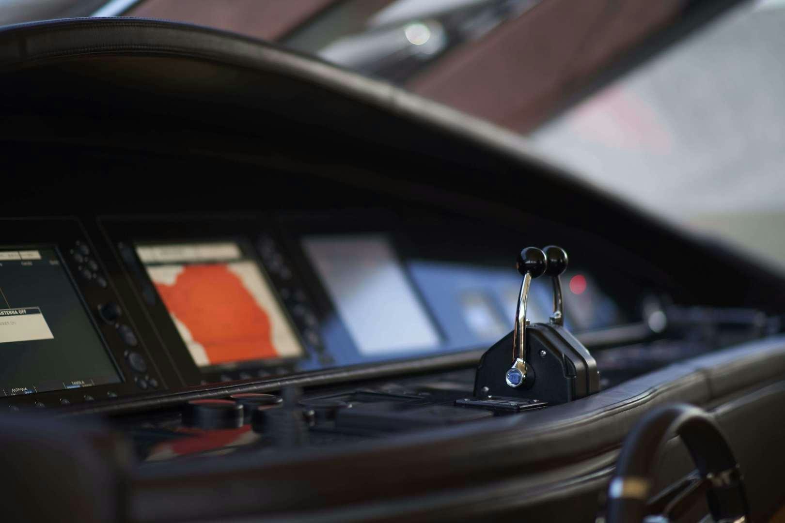 a black device with a black case aboard SYBER Yacht for Sale