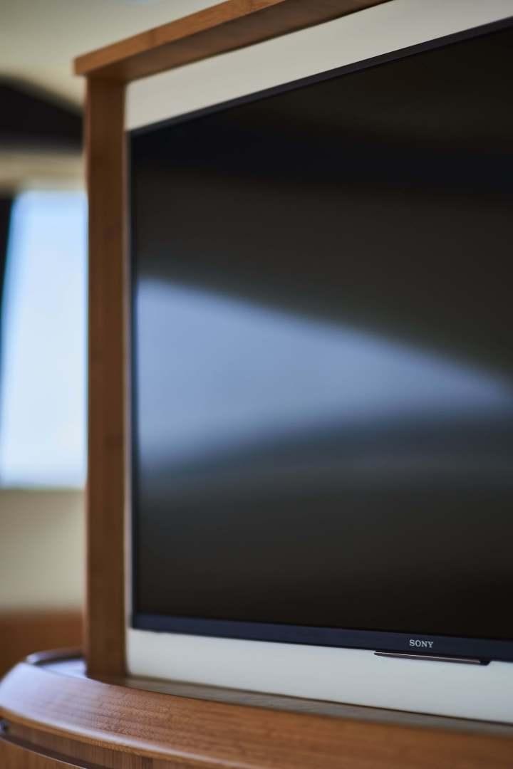 a black rectangular television aboard SYBER Yacht for Sale