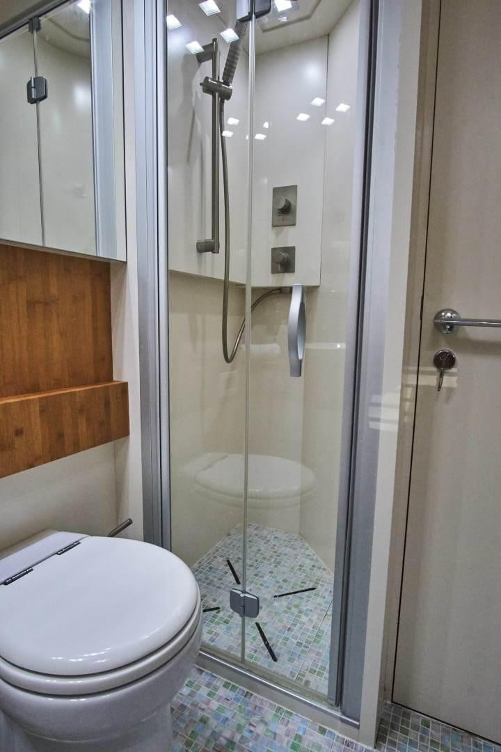 a shower with a glass door aboard SYBER Yacht for Sale